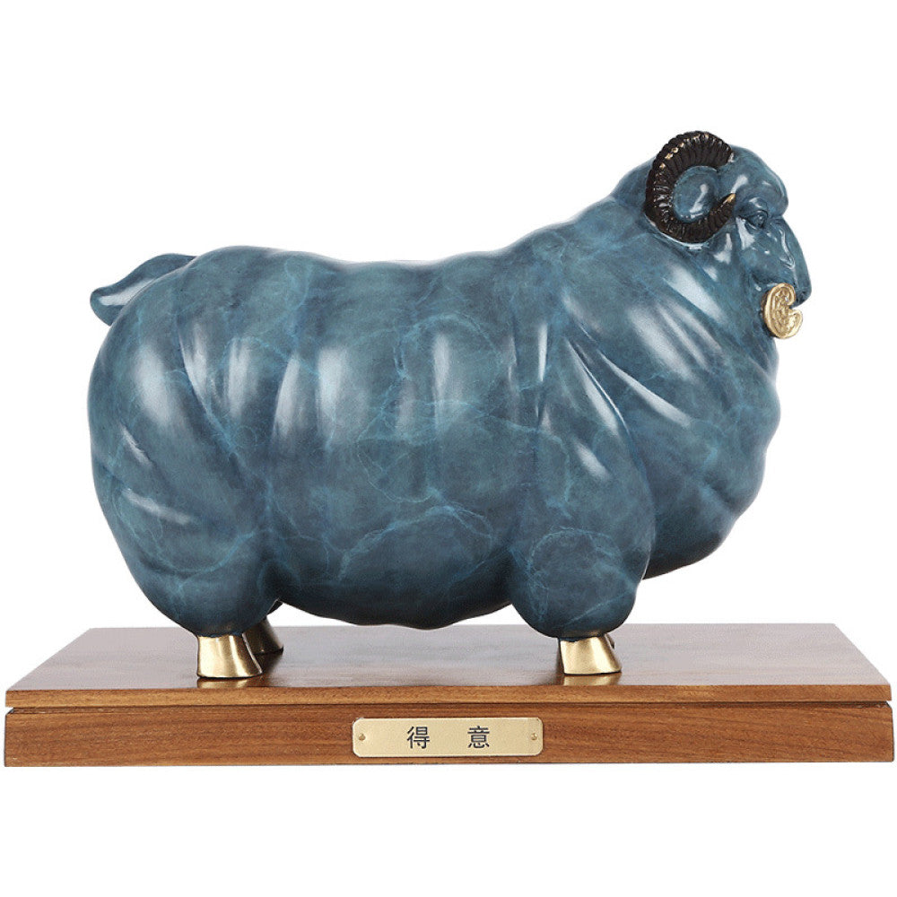 Blue ram statue with golden accents, a Feng Shui symbol of wealth and good fortune, displayed as stylish home decor on a wooden base in a living room setting 02