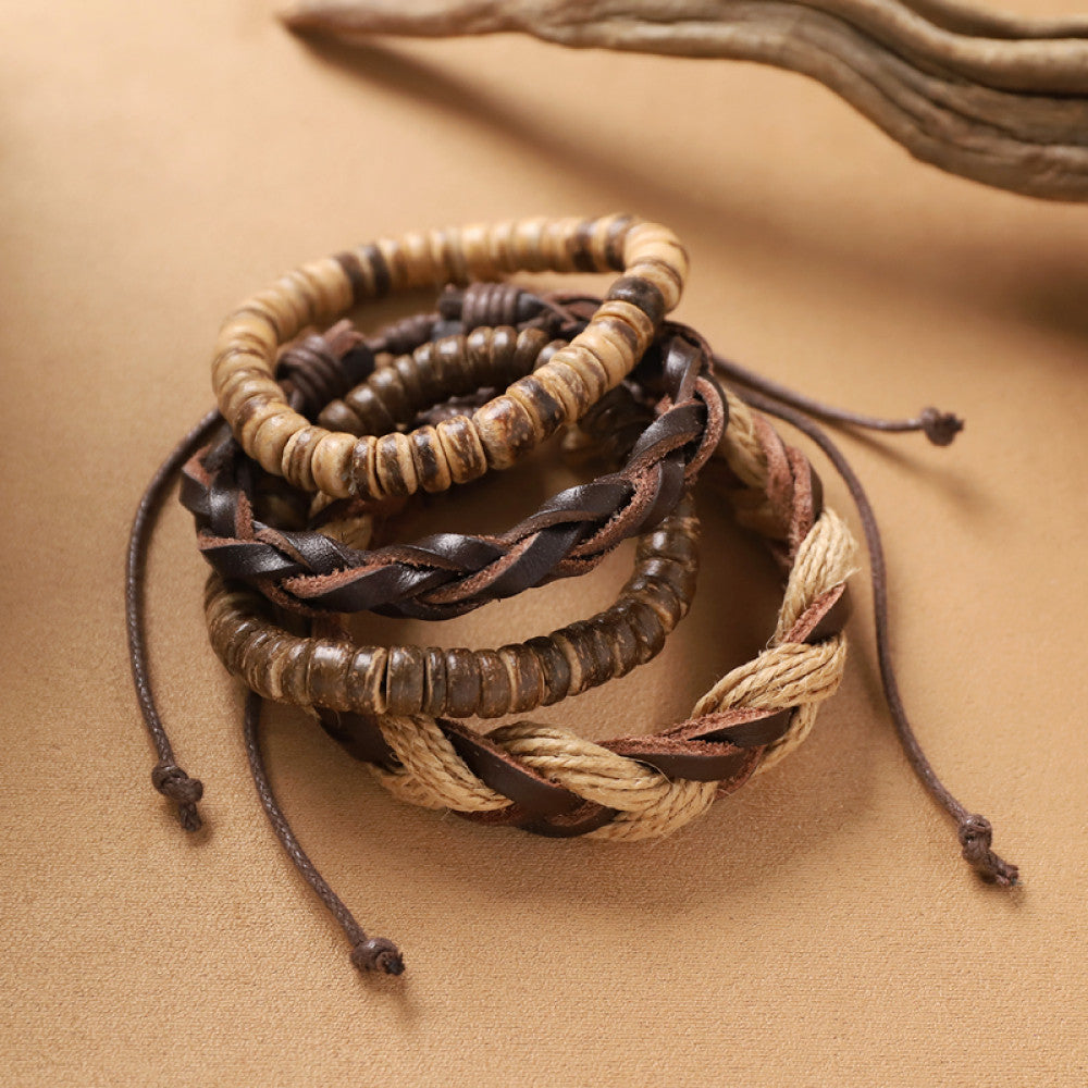 This bohemian stackable bracelet set features multiple layered strands in earthy tones, including turquoise, dark brown, green, and light brown beads, accented with decorative silver elements. The mix of natural materials and ethnic-inspired details creates a rich, textured look, perfect for layering to elevate casual outfits 10