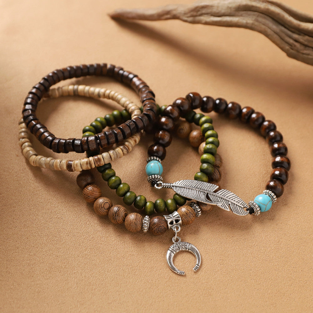 This bohemian stackable bracelet set features multiple layered strands in earthy tones, including turquoise, dark brown, green, and light brown beads, accented with decorative silver elements. The mix of natural materials and ethnic-inspired details creates a rich, textured look, perfect for layering to elevate casual outfits 13