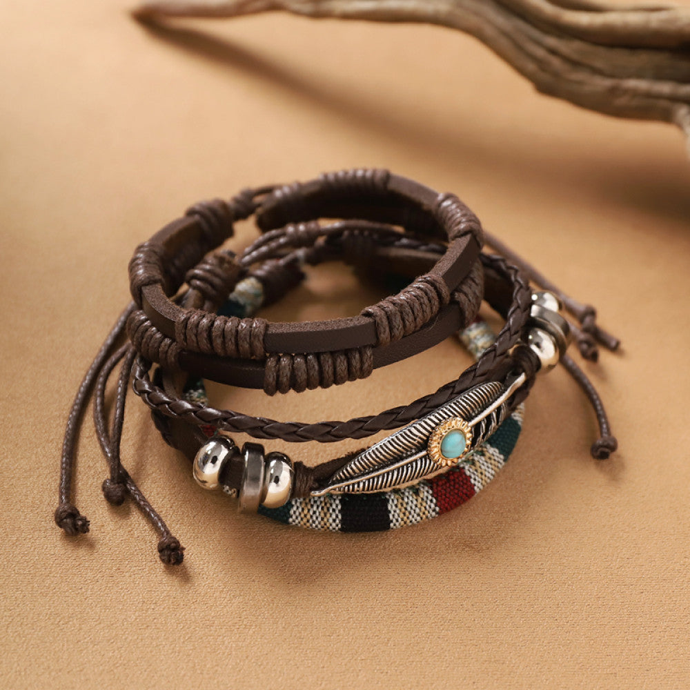 This bohemian stackable bracelet set features multiple layered strands in earthy tones, including turquoise, dark brown, green, and light brown beads, accented with decorative silver elements. The mix of natural materials and ethnic-inspired details creates a rich, textured look, perfect for layering to elevate casual outfits 2