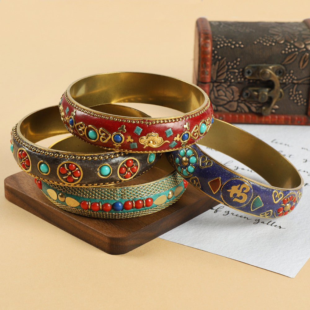 Vintage bohemian ethnic enamel bangle set with diverse colorful stone inlaid designs, featuring turquoise, red, blue styles, displayed on paper with a vintage box, ideal for boho fashion enthusiasts 01