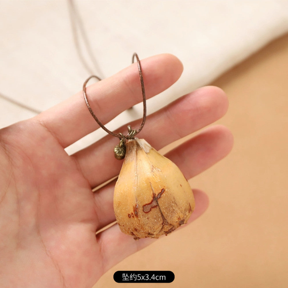 Vintage bohemian ethnic necklace with round natural stone pendant, featuring earthy brown tones and cord design, displayed on a neutral background with linen accent, ideal for boho fashion enthusiasts 03