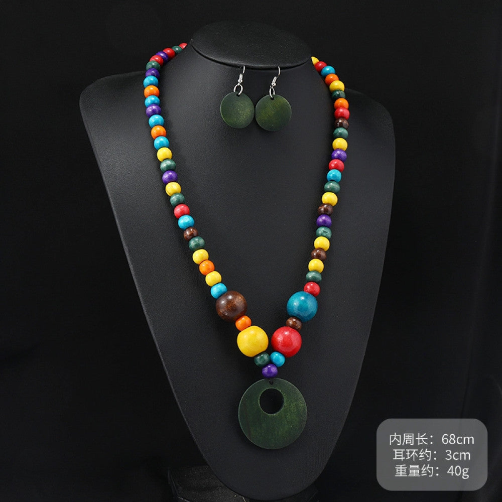 Vintage bohemian multi-layer wood beaded necklace with turquoise and colorful accents, featuring intricate layered design, ideal for ethnic tribal and boho fashion, displayed on a black mannequin against a dark background 03