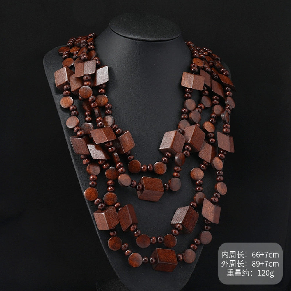 Vintage bohemian multi-layer wood beaded necklace with turquoise and colorful accents, featuring intricate layered design, ideal for ethnic tribal and boho fashion, displayed on a black mannequin against a dark background 04