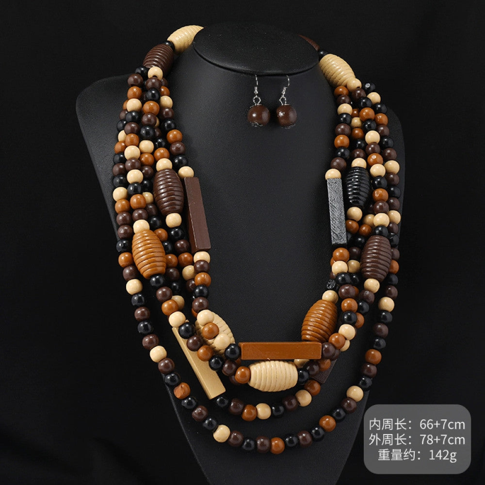 Vintage bohemian multi-layer wood beaded necklace with turquoise and colorful accents, featuring intricate layered design, ideal for ethnic tribal and boho fashion, displayed on a black mannequin against a dark background 05