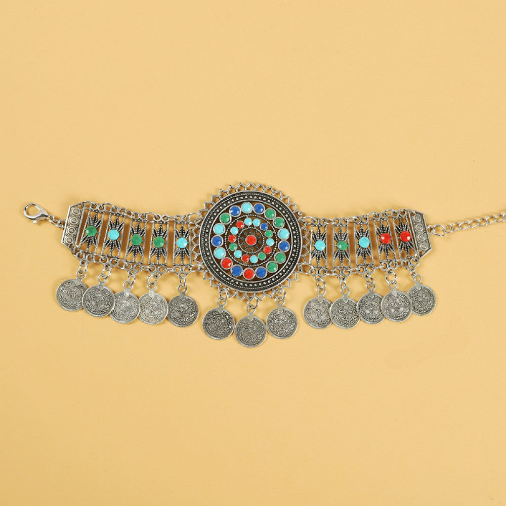 Boho ethnic gold-tone decorative belt featuring a vibrant colorful mosaic centerpiece, multi-color gemstone accents, and layered coin tassel pendants, displayed on a light yellow background, ideal for bohemian and festival fashion styling in the US 02