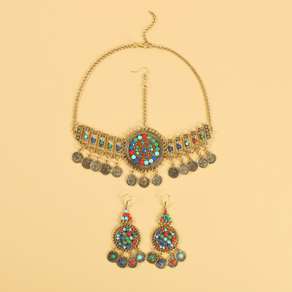 Boho ethnic silver-tone choker necklace featuring a vibrant colorful mosaic centerpiece, turquoise/gemstone decorative accents, and layered coin tassel pendants, displayed on a light yellow background, ideal for bohemian and festival fashion enthusiasts in the US 06