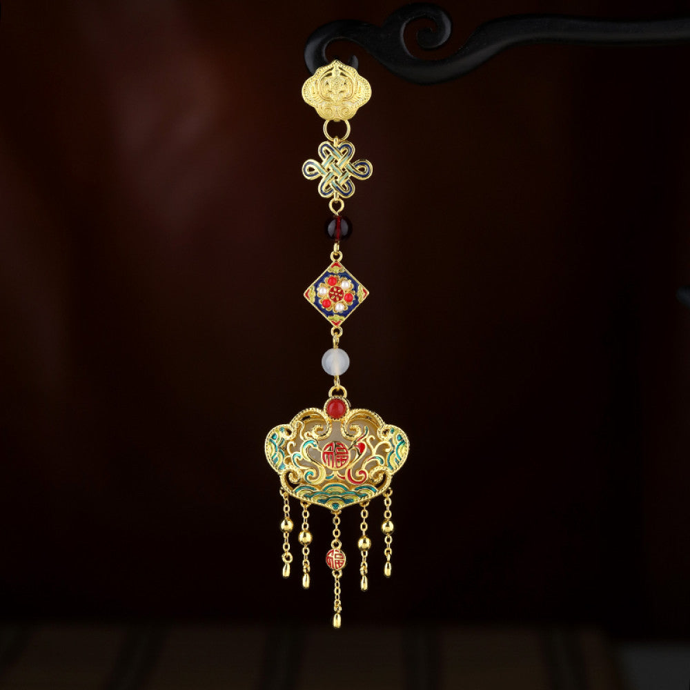 Boho vintage ethnic statement pendant charm with colorful enamel, gemstone accents and tassel details, styled on a display hook, ideal for bohemian and traditional fashion enthusiasts in the US