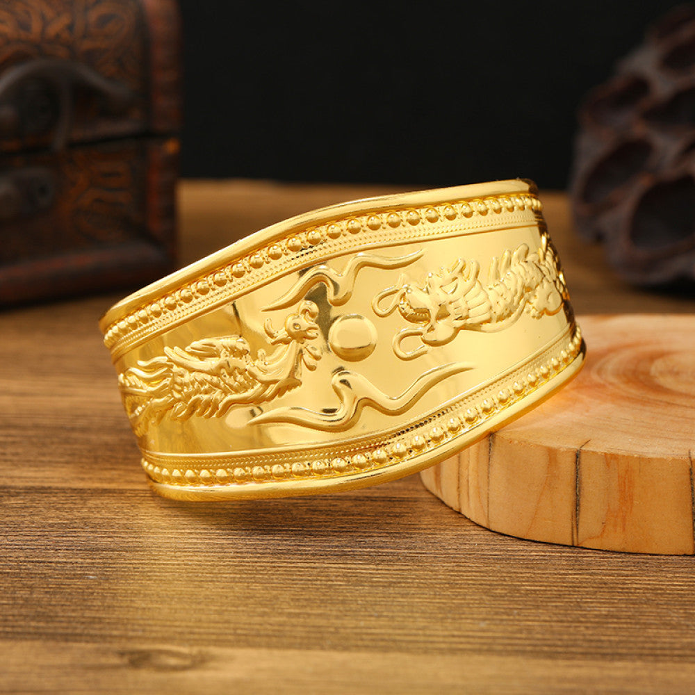 Boho vintage ethnic engraved gold cuff bangle with geometric designs, styled on wooden surface, ideal for bohemian and tribal fashion enthusiasts 012