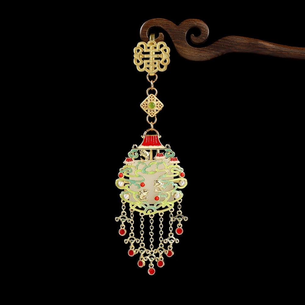 Boho vintage ethnic gold-tone hair pendant featuring intricate Chinese knot clasp, palace-style decorative pendant with red enamel details, and layered red beaded tassels, styled on a wooden display hook against a black background, ideal for bohemian and traditional fashion enthusiasts in the US