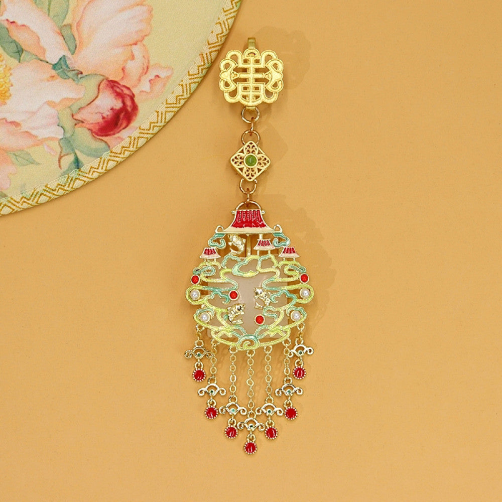Boho vintage ethnic gold-tone hair pendant featuring intricate Chinese knot clasp, palace-style decorative pendant with red enamel details, and layered red beaded tassels, styled on a wooden display hook against a black background, ideal for bohemian and traditional fashion enthusiasts in the US 02
