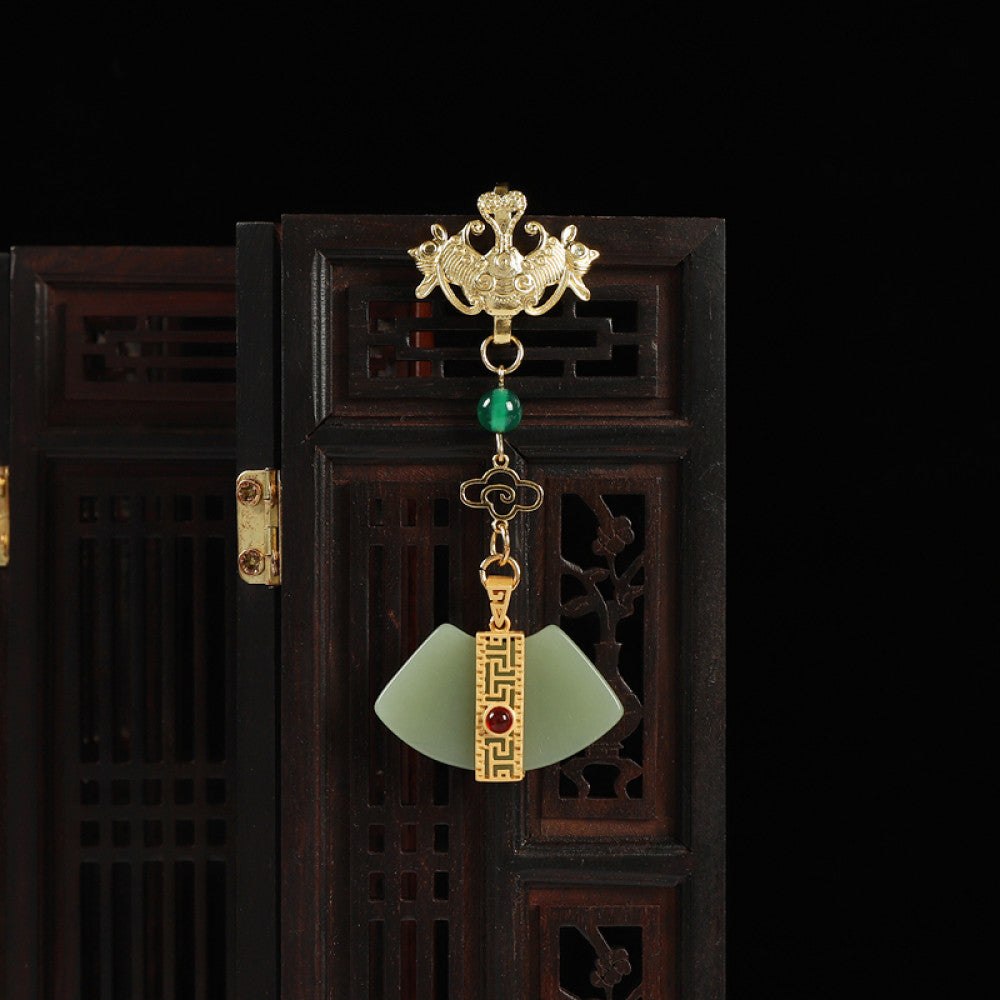 Boho vintage ethnic gold-tone hair pendant featuring phoenix decorative charm, green bead accents, jade fan-shaped pendant with red gemstone detail, styled on a wooden display hook against a black background, ideal for bohemian and traditional fashion enthusiasts in the US 02