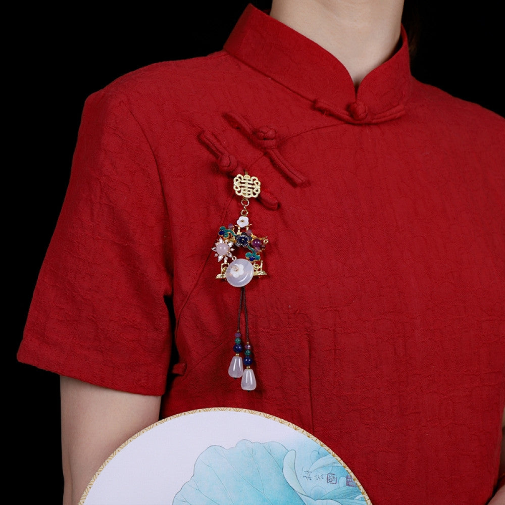 Boho vintage ethnic gold-tone hair pendant featuring double happiness charm, colorful gemstone accents, white jade details and decorative tassels, styled on a wooden display hook, ideal for bohemian and traditional fashion enthusiasts in the US 01