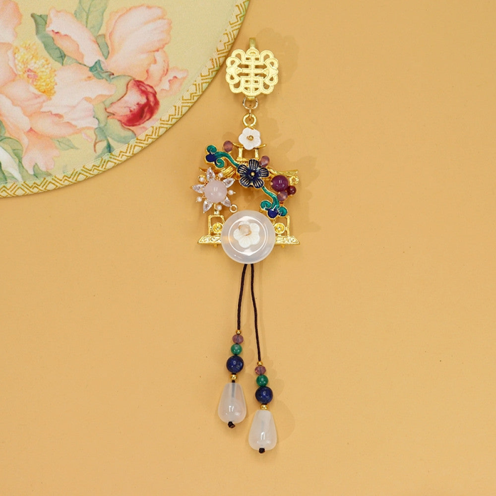 Boho vintage ethnic gold-tone hair pendant featuring double happiness charm, colorful gemstone accents, white jade details and decorative tassels, styled on a wooden display hook, ideal for bohemian and traditional fashion enthusiasts in the US 02