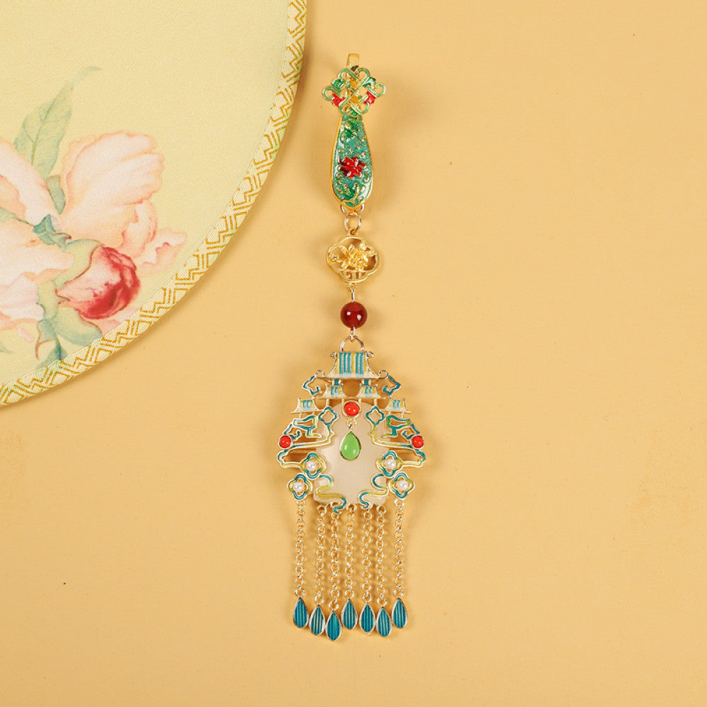 Boho vintage ethnic gold-tone hair pendant featuring colorful enamel accents, white gemstone center, palace-style charm and turquoise tassel details, styled on a wooden display hook, ideal for bohemian and traditional fashion enthusiasts in the US 02