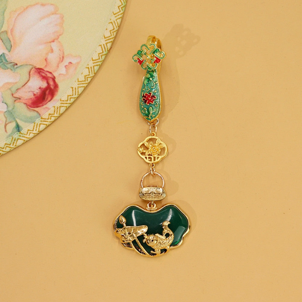 Boho vintage ethnic gold-tone hair pendant featuring green enamel accents, Chinese knot detail, and a carved green agate lock charm, styled on a wooden display hook, ideal for bohemian and traditional fashion enthusiasts in the US 02