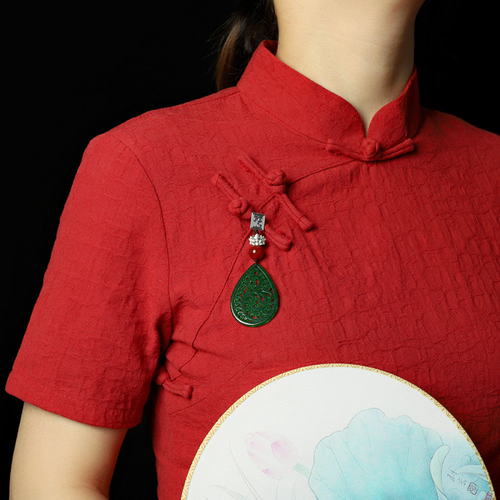 Boho vintage ethnic green cutout hair pendant charm featuring red bead and fu character detail, styled on a display hook, ideal for bohemian and traditional fashion enthusiasts in the US 02