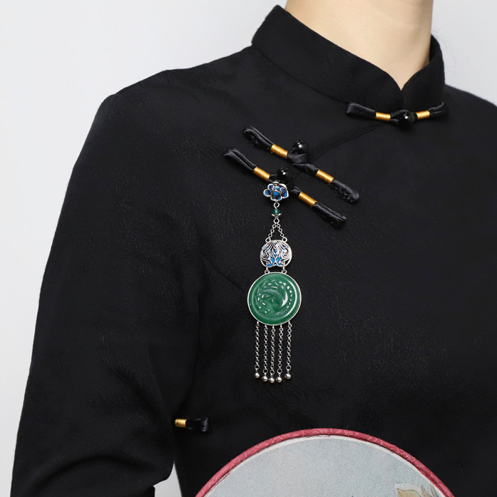 Boho vintage ethnic silver hair pendant charm featuring a green carved gemstone and blue enamel accents, styled on a display hook, ideal for bohemian and traditional fashion enthusiasts in the US 02