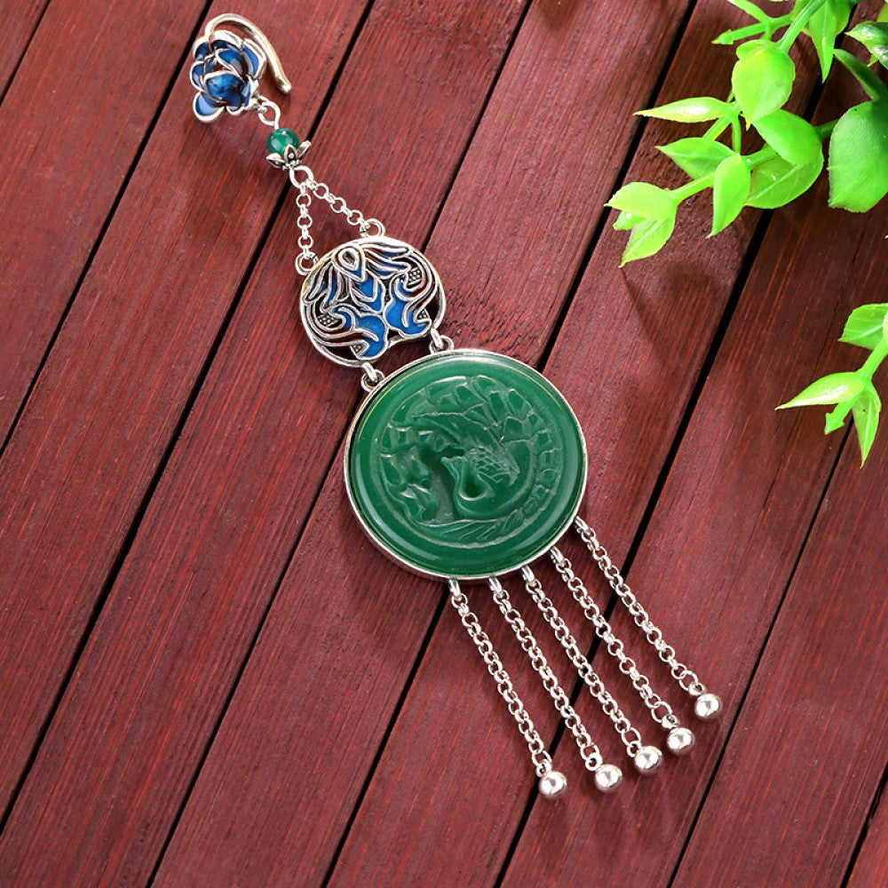 Boho vintage ethnic silver hair pendant charm featuring a green carved gemstone and blue enamel accents, styled on a display hook, ideal for bohemian and traditional fashion enthusiasts in the US 03