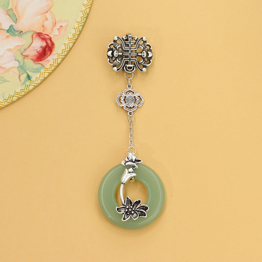 Boho vintage ethnic silver hair pendant featuring Chinese knot detail, green jade ring with lotus carving, styled on a Chinese wooden frame, ideal for bohemian and traditional fashion enthusiasts in the US 03