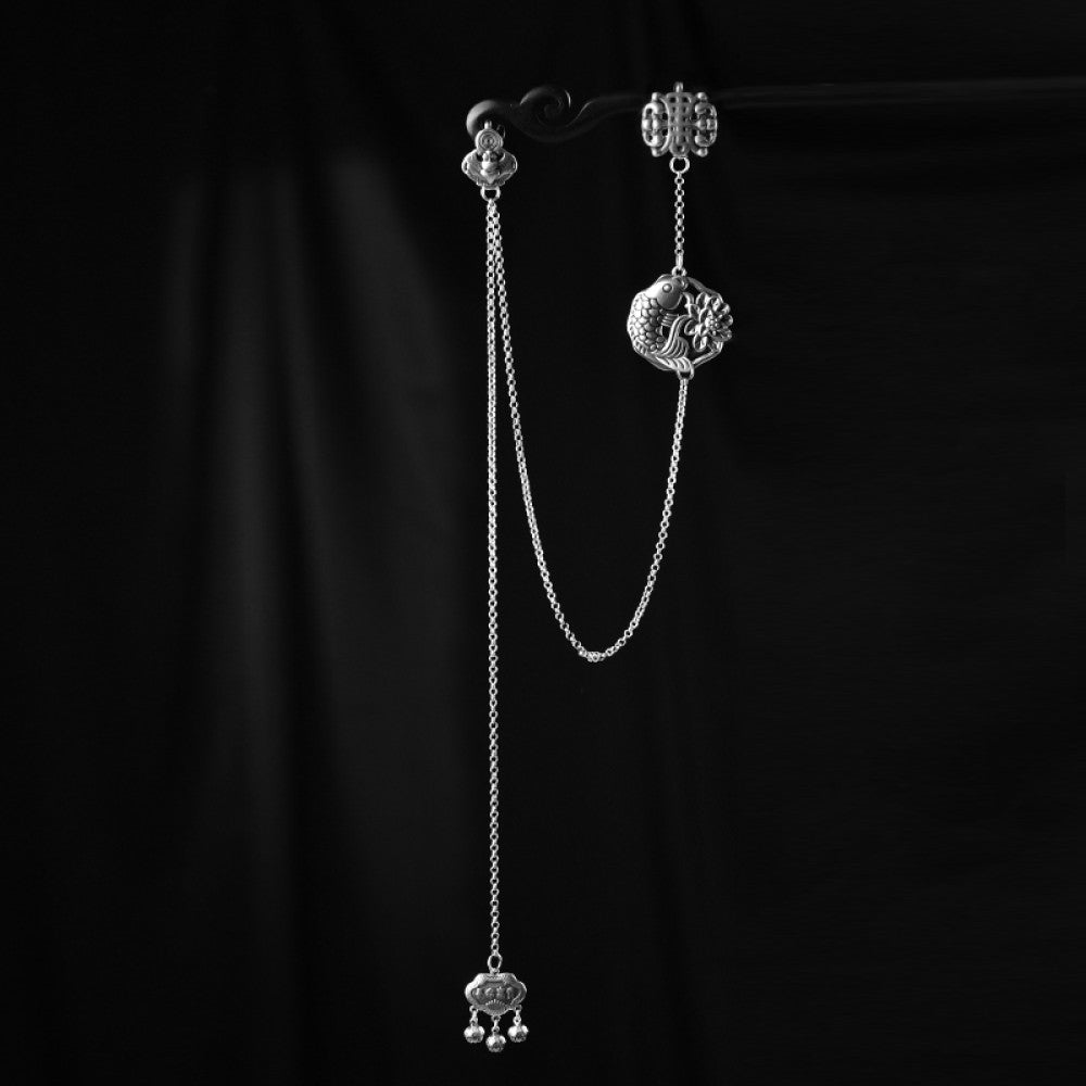 Boho vintage ethnic silver long chain statement pendant with carved charm and bell details, styled on a display hook, ideal for bohemian and traditional fashion enthusiasts in the US