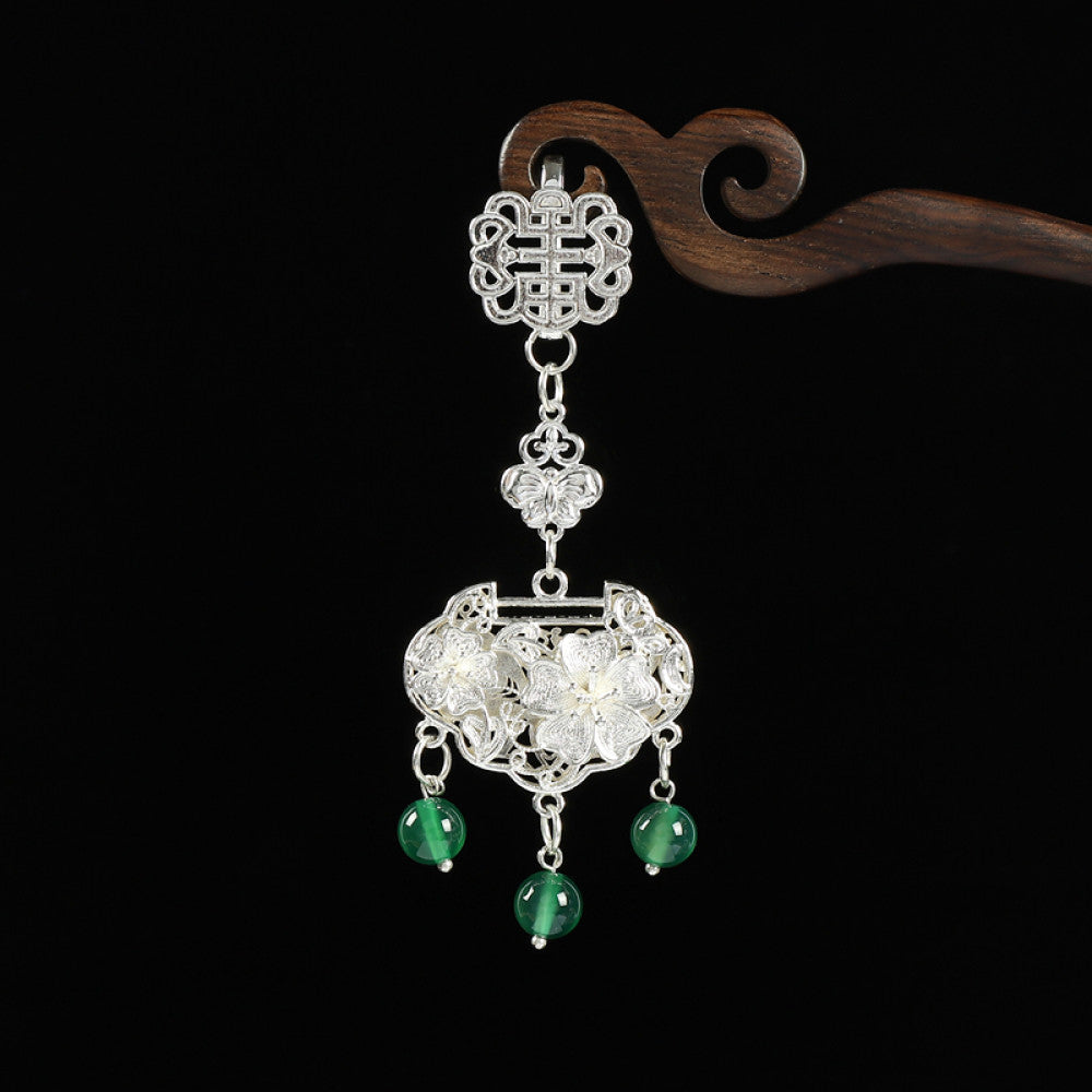 Boho vintage ethnic silver hair pendant featuring Chinese knot, intricate lantern charm and red bead details, styled on a wooden display hook, ideal for bohemian and traditional fashion enthusiasts in the US 01