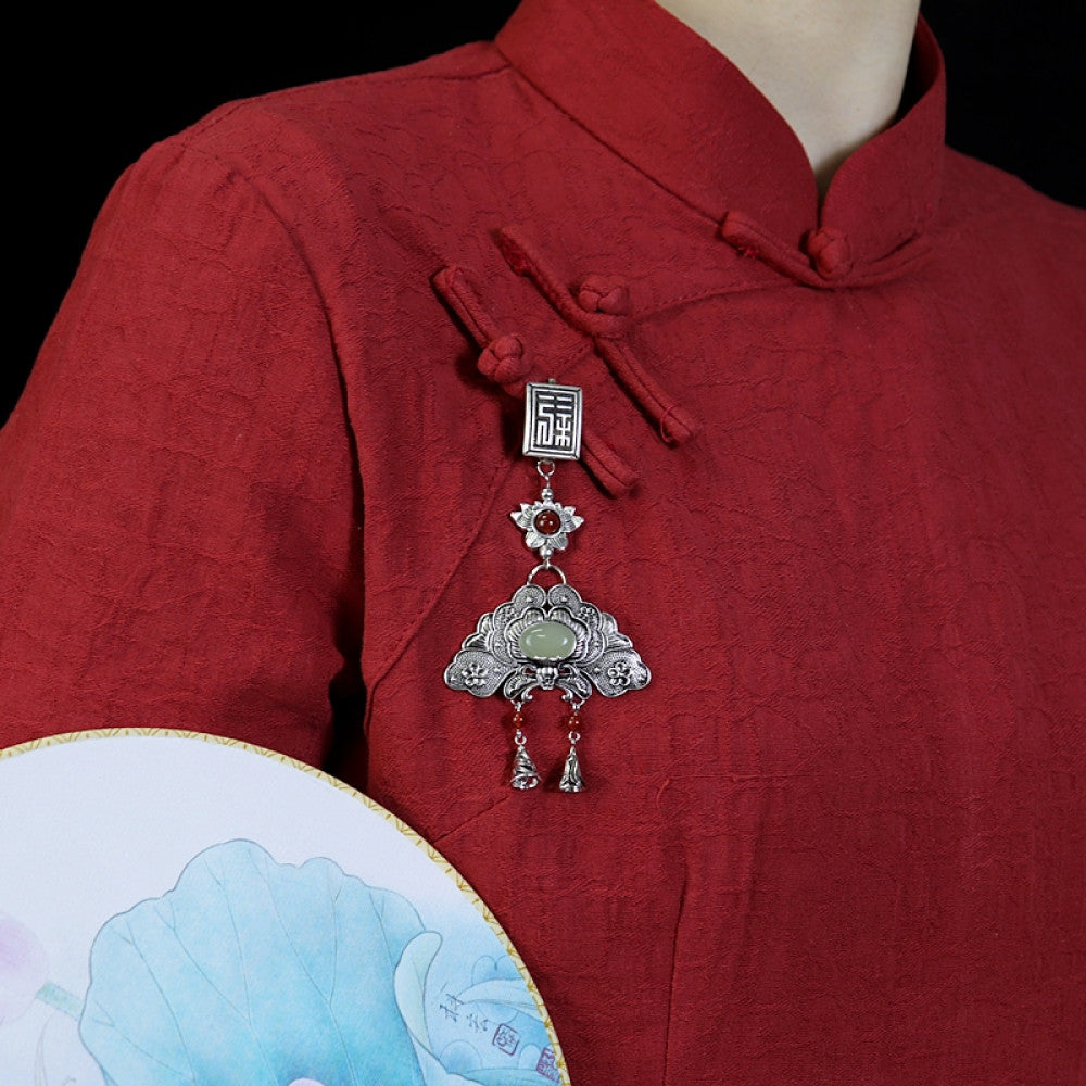 Boho vintage ethnic silver hair pendant featuring fu character, red gemstone accents, jade-inlaid fan-shaped charm and red tassel details, styled on a wooden display hook, ideal for bohemian and traditional fashion enthusiasts in the US 01