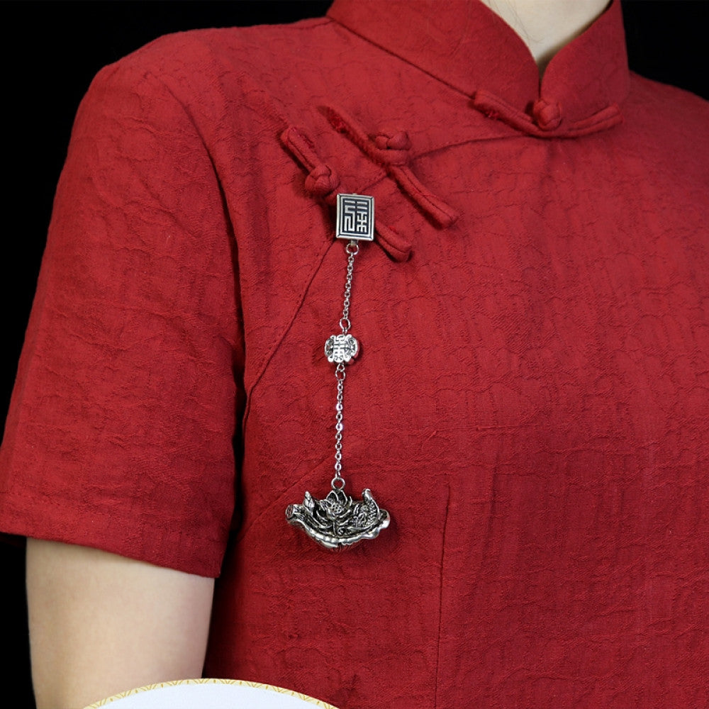 Boho vintage ethnic silver hair pendant featuring fu character detail and traditional lotus charm, styled on a wooden display hook, ideal for bohemian and traditional fashion enthusiasts in the US 01