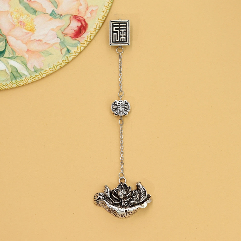 Boho vintage ethnic silver hair pendant featuring fu character detail and traditional lotus charm, styled on a wooden display hook, ideal for bohemian and traditional fashion enthusiasts in the US 02