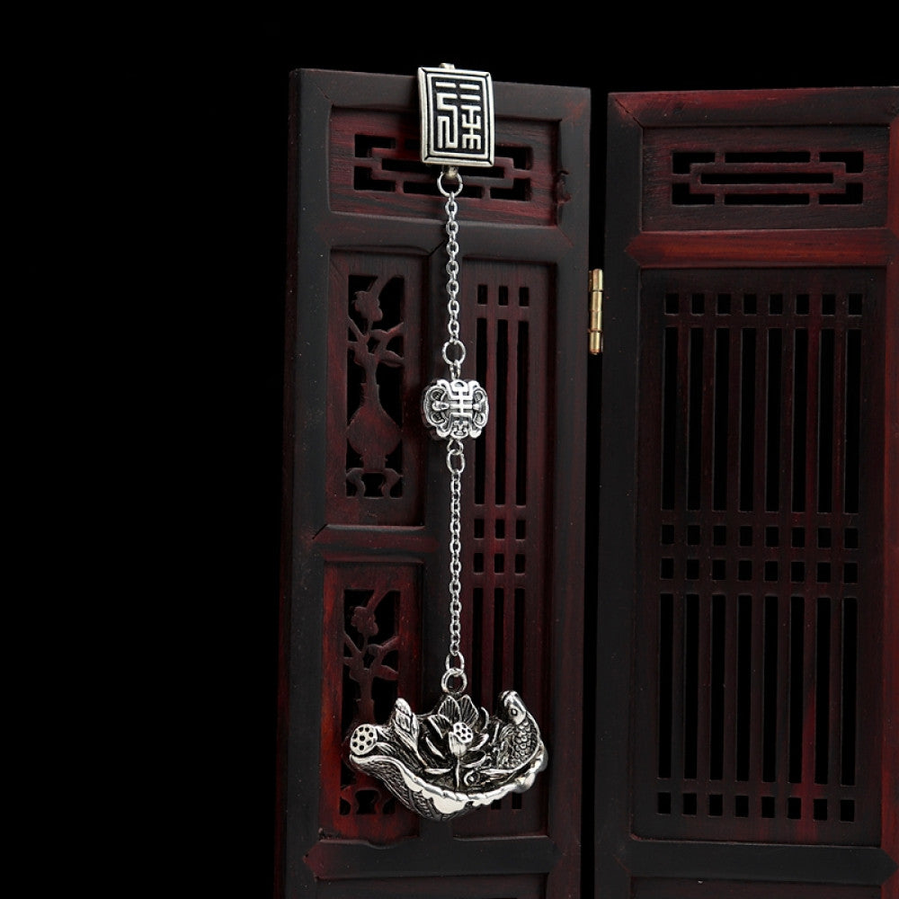 Boho vintage ethnic silver hair pendant featuring fu character detail and traditional lotus charm, styled on a wooden display hook, ideal for bohemian and traditional fashion enthusiasts in the US 03