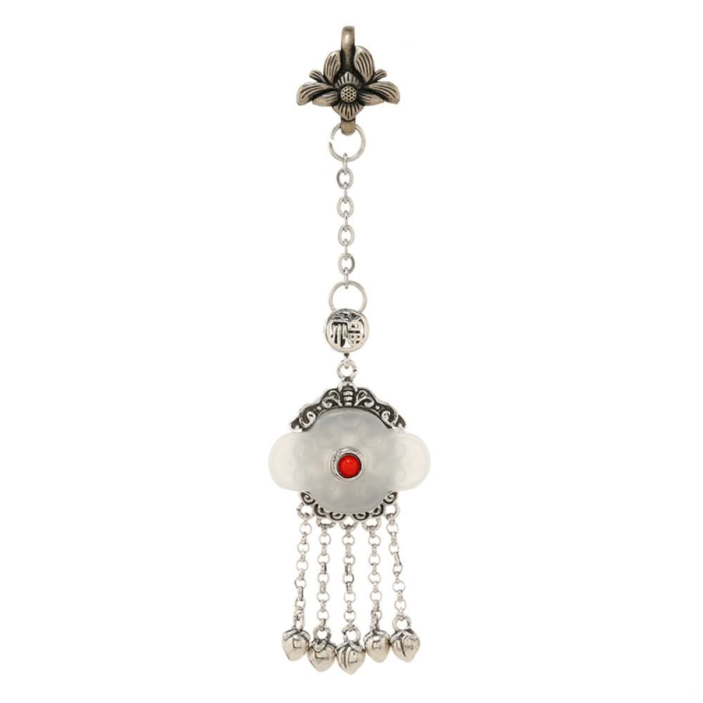 Boho vintage ethnic silver hair pendant featuring red gemstone center, clover-shaped white charm and silver tassel details, styled on a woo 04