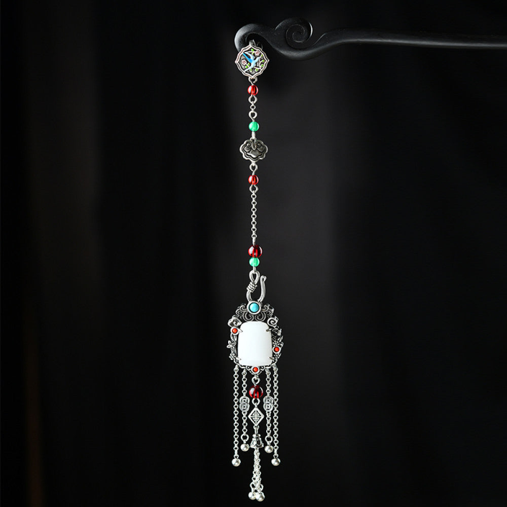 Boho vintage ethnic silver statement pendant with colorful beads, white gemstone center and tassel details, styled on a display hook, ideal for bohemian and traditional fashion enthusiasts in the US