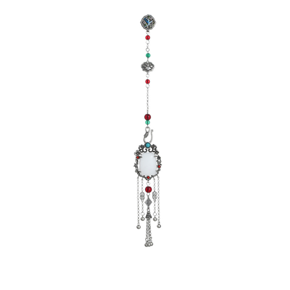 Boho vintage ethnic silver statement pendant with colorful beads, white gemstone center and tassel details, styled on a display hook, ideal for bohemian and traditional fashion enthusiasts in the US 03