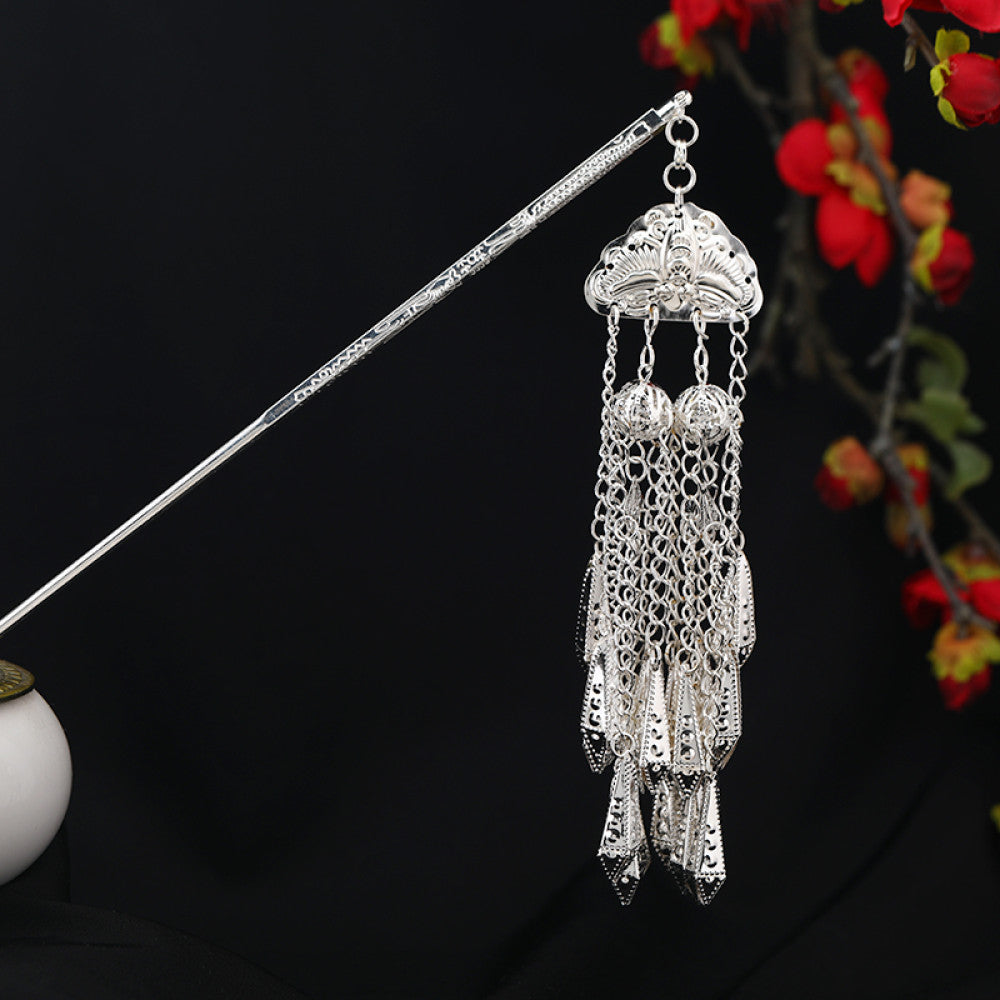 Boho vintage ethnic silver-tone hair stick featuring an intricate rooster-shaped charm, detailed decorative accents, and layered silver tassel pendants, displayed against a black background with red floral decor, ideal for bohemian and traditional fashion enthusiasts in the US 03