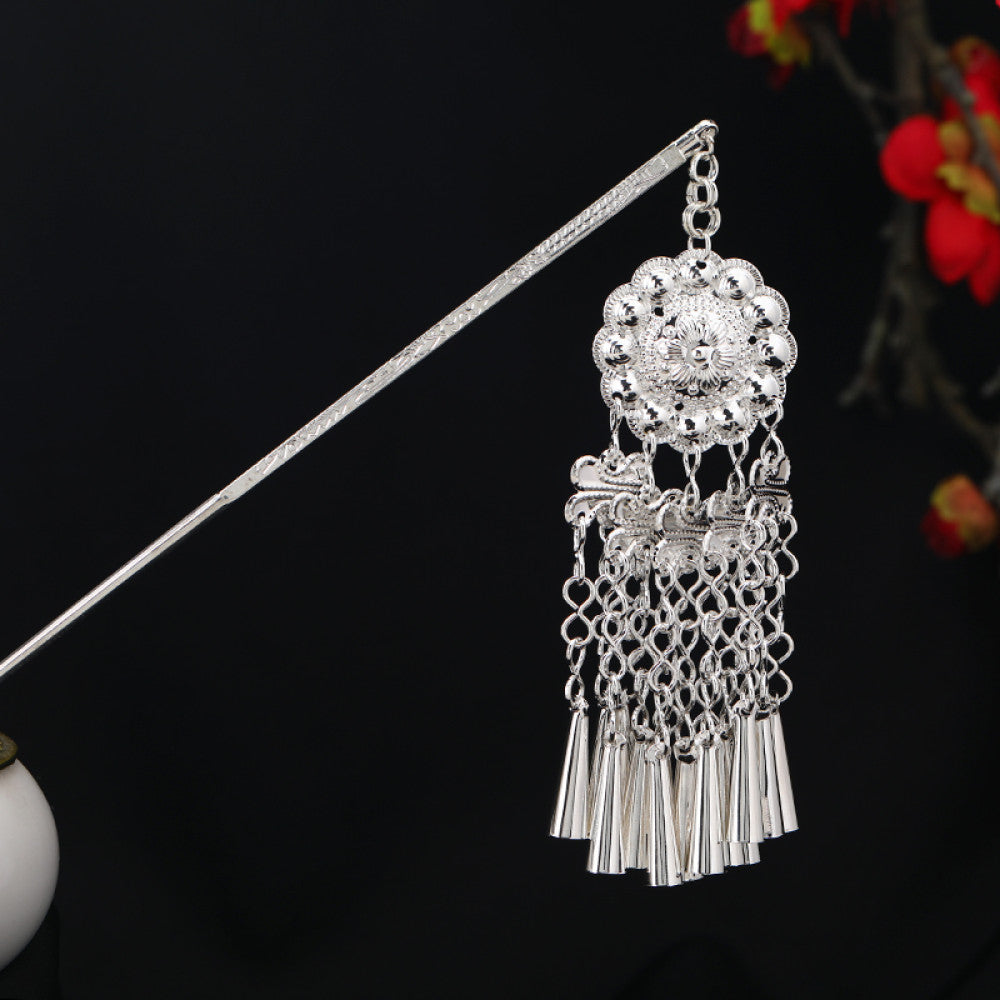 Boho vintage ethnic silver-tone hair stick featuring an intricate rooster-shaped charm, detailed decorative accents, and layered silver tassel pendants, displayed against a black background with red floral decor, ideal for bohemian and traditional fashion enthusiasts in the US 04