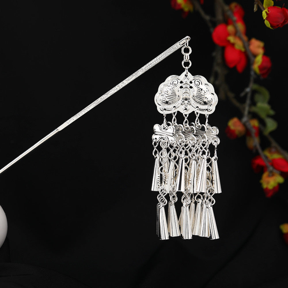 Boho vintage ethnic silver-tone hair stick featuring an intricate rooster-shaped charm, detailed decorative accents, and layered silver tassel pendants, displayed against a black background with red floral decor, ideal for bohemian and traditional fashion enthusiasts in the US 05