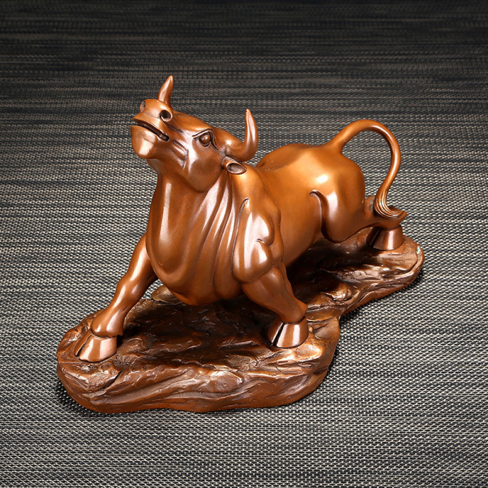 Bronze bull statue with a powerful stance, a Feng Shui symbol of strength and good fortune, displayed as elegant home decor against a textured background 01