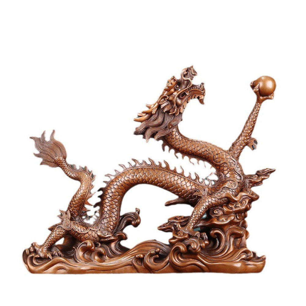 Intricate bronze Chinese dragon statue with detailed scales, a Feng Shui symbol of good fortune and strength, displayed as elegant home decor against a textured background 12