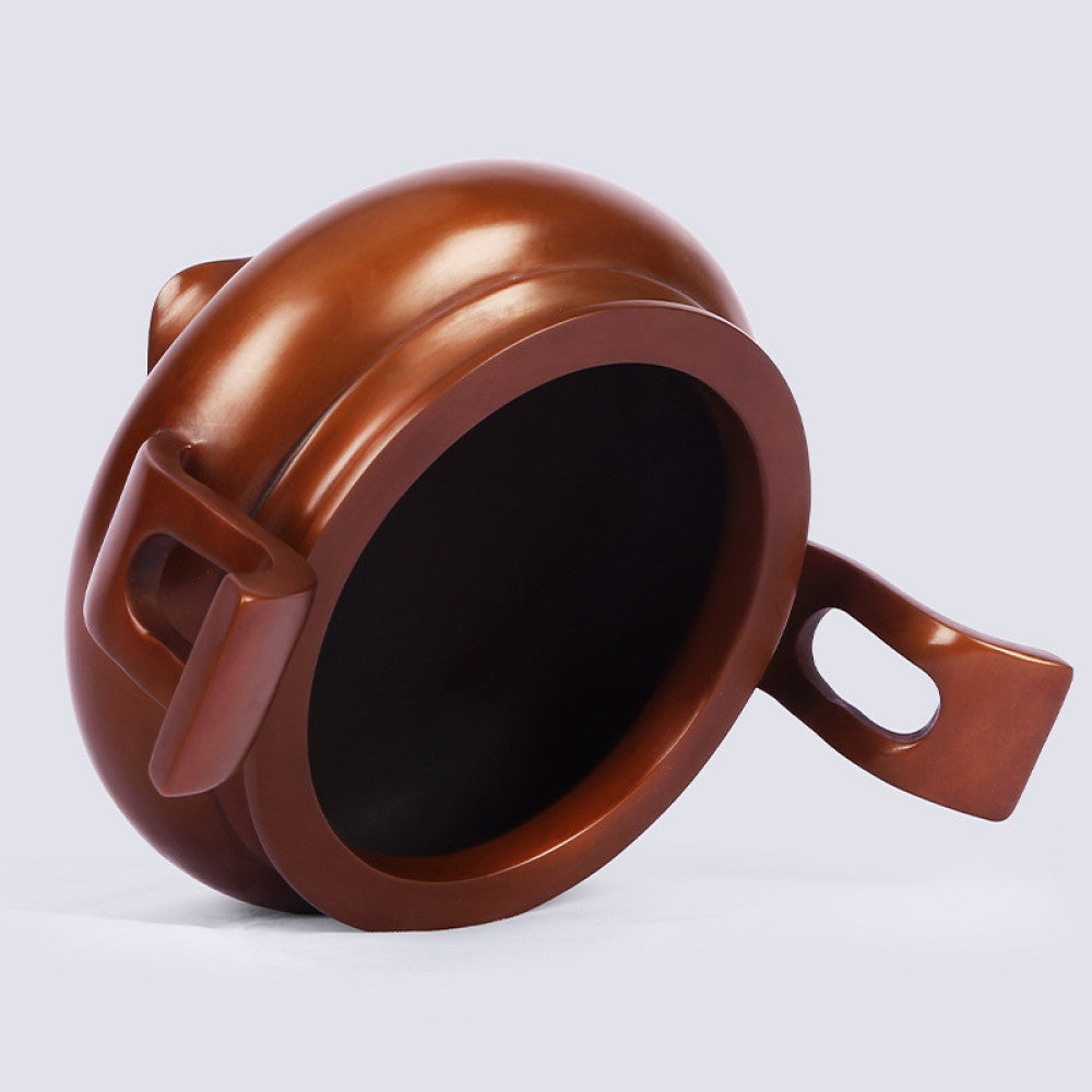 Polished bronze Chinese incense burner with elegant curved handles and three feet, a Feng Shui symbol of wealth and harmony, displayed as refined home decor against a white background 03