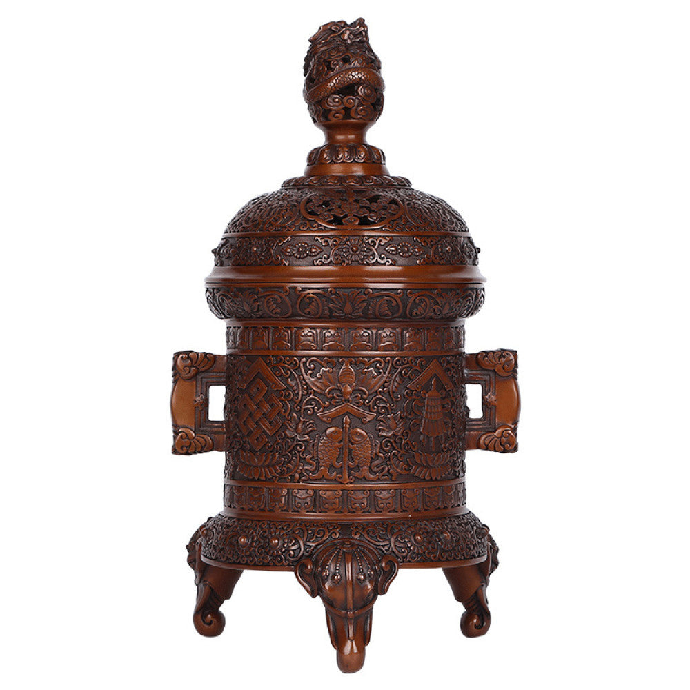 Intricate bronze Chinese incense burner with detailed auspicious carvings, dragon-shaped finial, and elephant-head feet, a Feng Shui symbol of wealth and protection, displayed as an elegant home decor piece against a white background