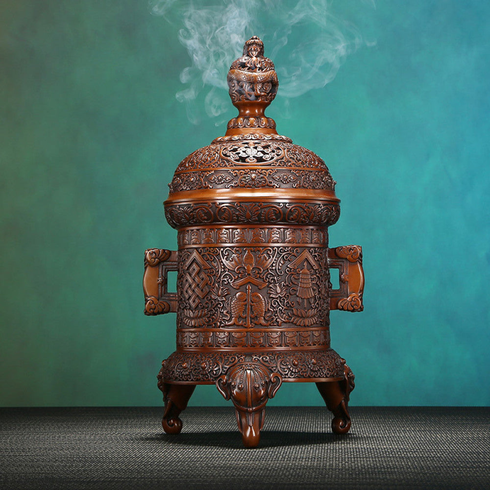 Intricate bronze Chinese incense burner with detailed auspicious carvings, dragon-shaped finial, and elephant-head feet, a Feng Shui symbol of wealth and protection, displayed as an elegant home decor piece against a white background 01