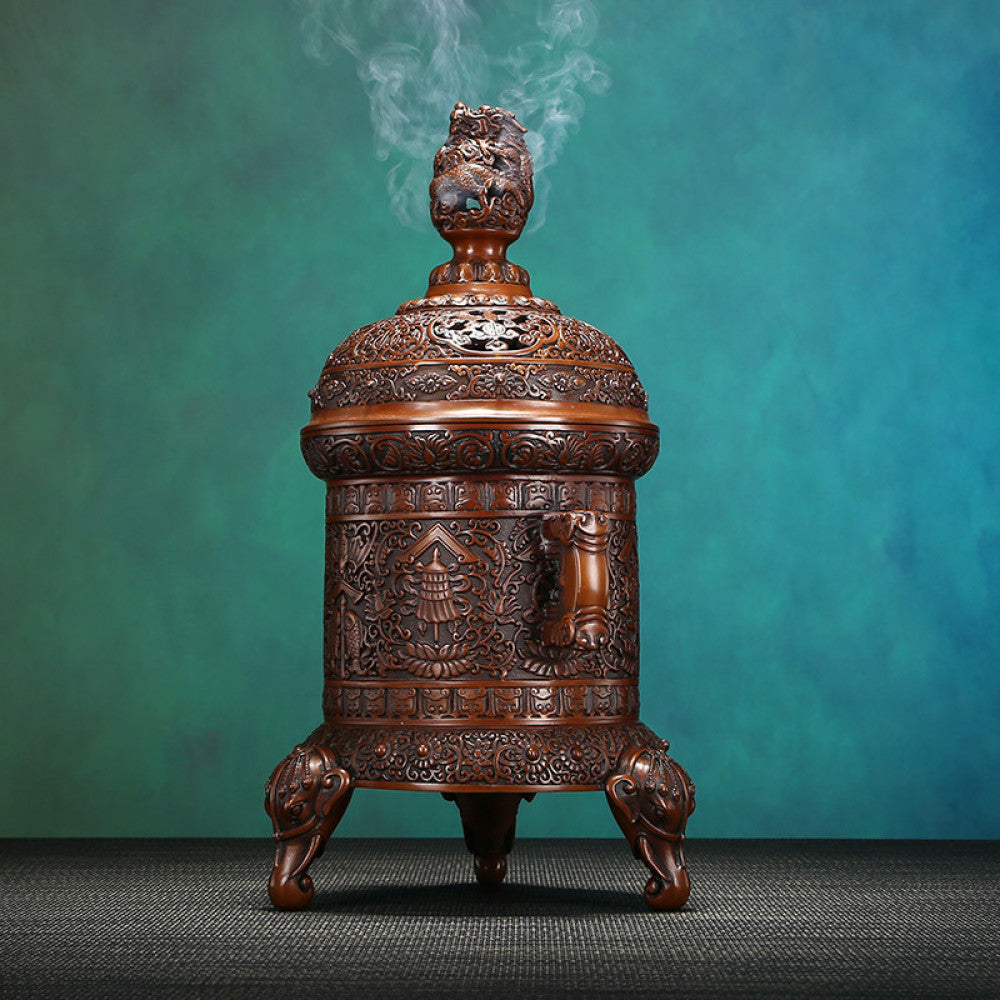 Intricate bronze Chinese incense burner with detailed auspicious carvings, dragon-shaped finial, and elephant-head feet, a Feng Shui symbol of wealth and protection, displayed as an elegant home decor piece against a white background 02
