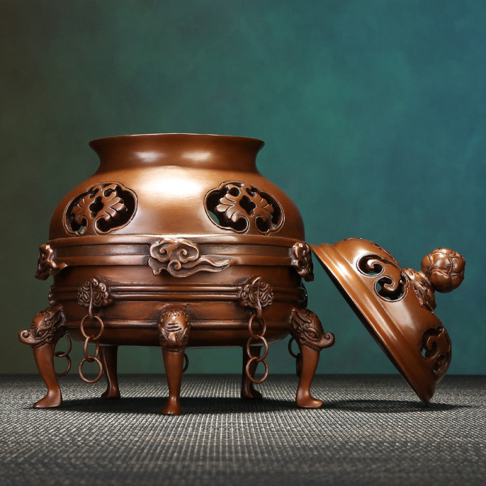 Intricate bronze Chinese incense burner with lotus-topped pierced lid, elaborate cloud carvings, and beast-shaped feet, emitting incense smoke, a Feng Shui symbol of wealth and harmony, displayed as a sophisticated home decor piece against a textured teal background 02