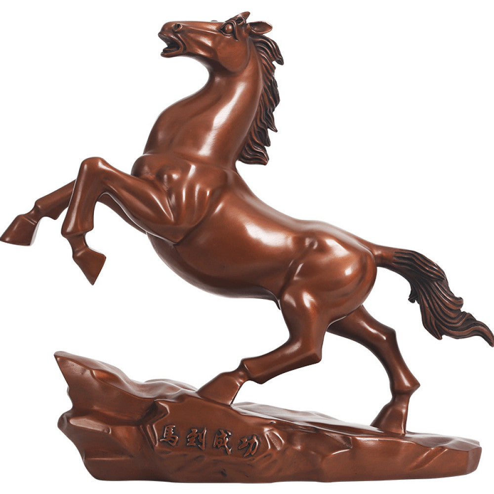 Bronze horse statue with a rearing stance, a Feng Shui symbol of success and achievement, displayed as elegant home decor against a dark blue background 03