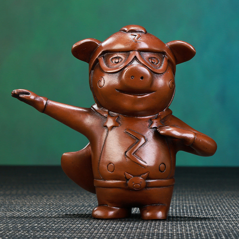 Charming bronze pilot animal statue with detailed aviation gear, a Feng Shui symbol of ambition and success, displayed as unique home decor against a textured background 02