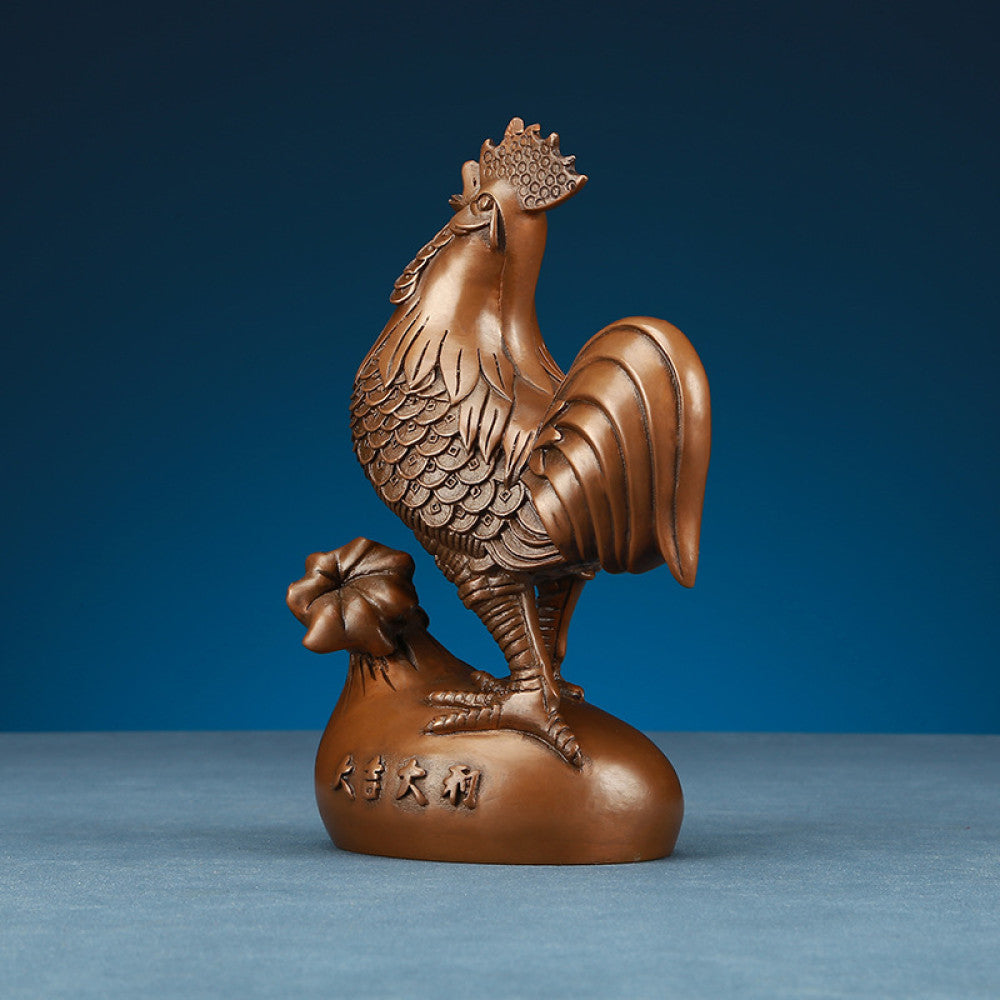 Intricate bronze rooster statue, a Feng Shui symbol of good fortune, displayed as elegant home decor against a blue background 01
