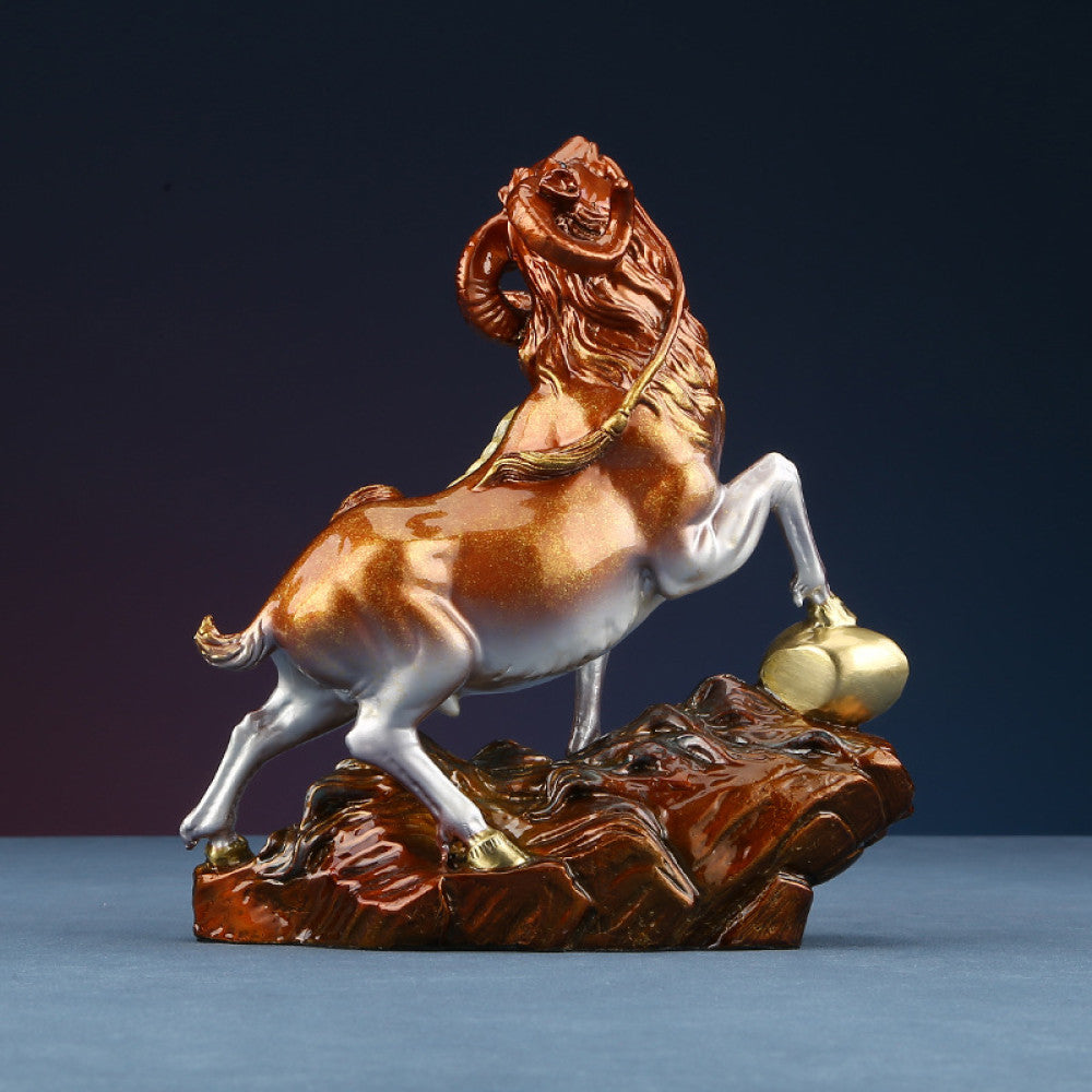 Colorful goat statue with golden details, a Feng Shui symbol of wealth and good fortune, displayed as elegant home decor on a textured base against a dark background 02