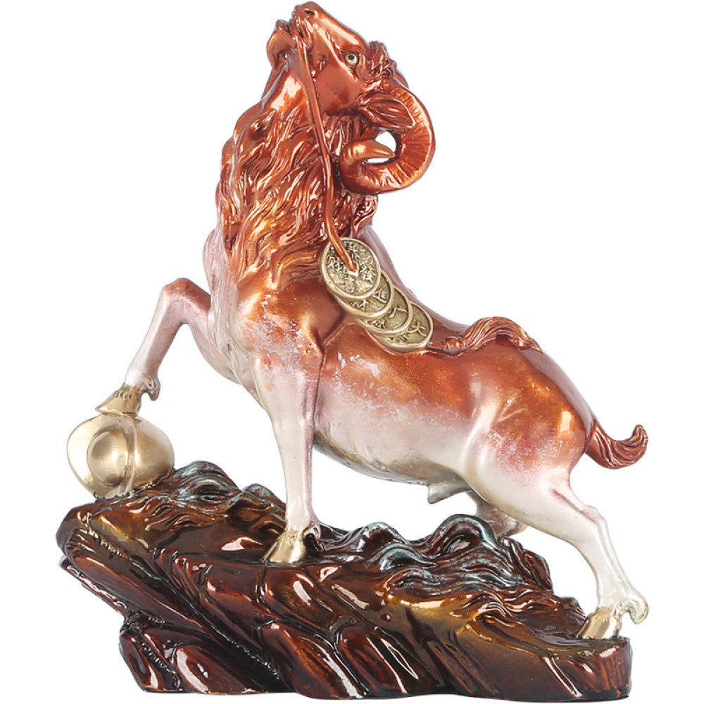Colorful goat statue with golden details, a Feng Shui symbol of wealth and good fortune, displayed as elegant home decor on a textured base against a dark background 03