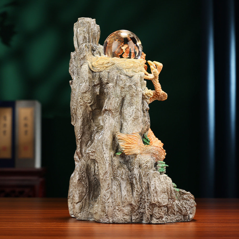 Intricate orange dragon statue with a crystal ball, a Feng Shui symbol of good fortune and strength, displayed as unique home decor on a wooden table against a dark green background 02