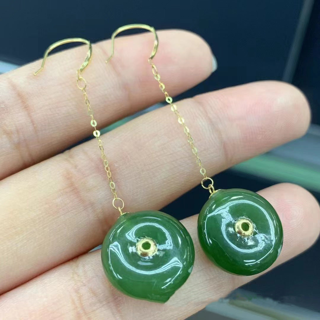 Exquisite Hotan jade peace knot earrings with 18K gold accessories, showcasing the charm of traditional peace knot designs